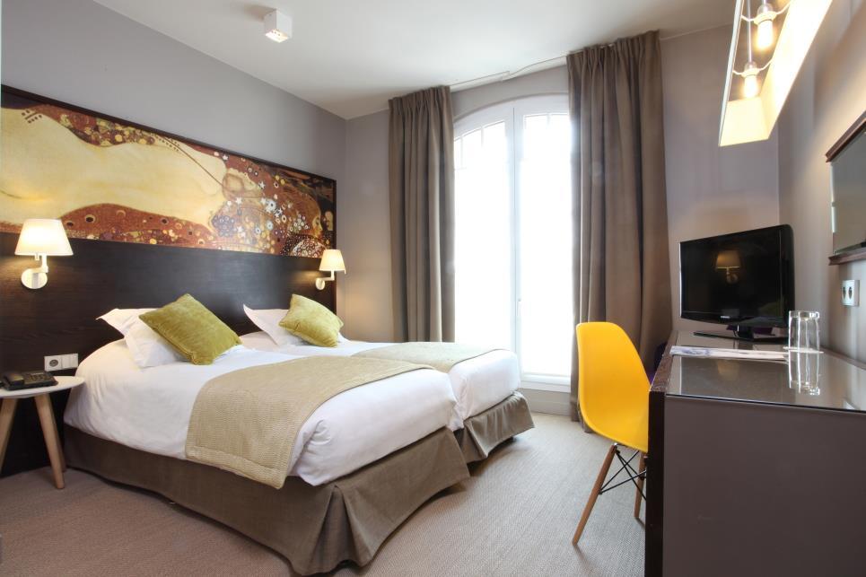 Hotel Golden Tulip Washington Opera París Habitación foto